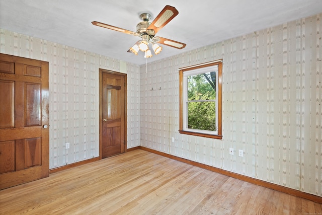 41 Beaver Brook Rd, Danbury, CT 06810 - empty room featuring baseboards, light wood-style floors, a ceiling fan, and wallpapered walls