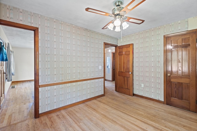 41 Beaver Brook Rd, Danbury, CT 06810 - spare room featuring baseboards, wood finished floors, and ceiling fan