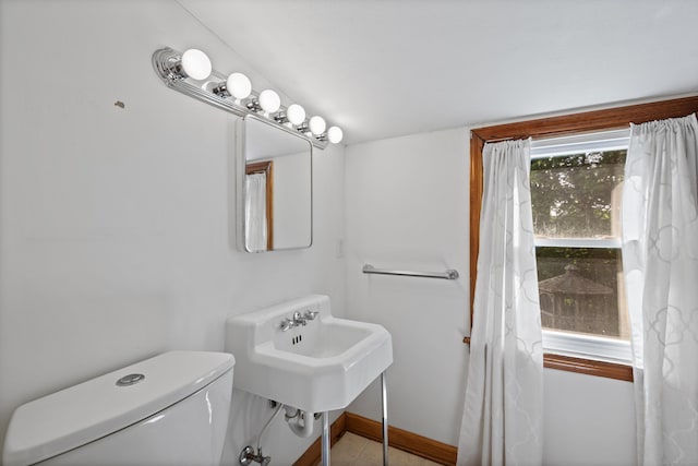 41 Beaver Brook Rd, Danbury, CT 06810 - bathroom featuring toilet, baseboards, and a sink