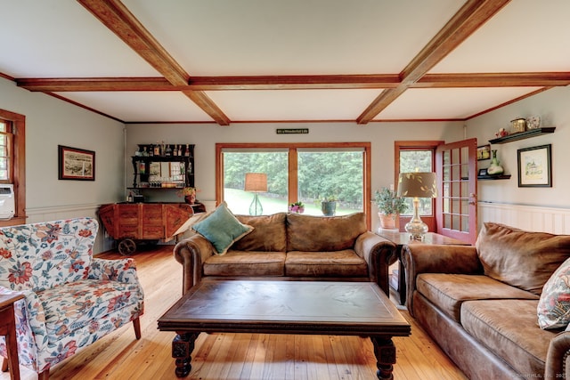 96 Middle Haddam Rd, East Hampton, CT 06456 - living area with coffered ceiling, beam ceiling, light wood-style floors, plenty of natural light, and a wainscoted wall