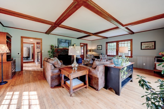 96 Middle Haddam Rd, East Hampton, CT 06456 - living area with coffered ceiling, light wood finished floors, beamed ceiling, wainscoting, and a brick fireplace