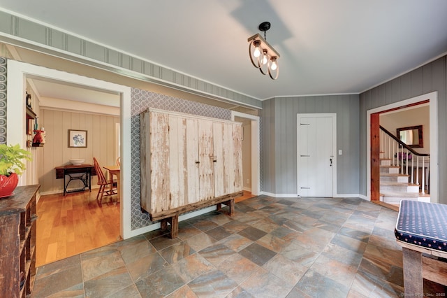 96 Middle Haddam Rd, East Hampton, CT 06456 - foyer entrance featuring stone finish flooring, stairs, baseboards, and ornamental molding