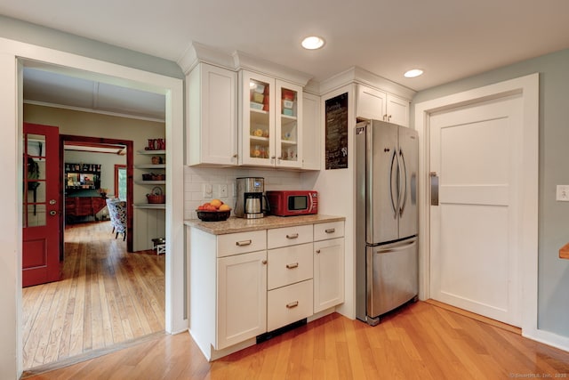 96 Middle Haddam Rd, East Hampton, CT 06456 - kitchen with freestanding refrigerator, light wood-type flooring, white cabinets, glass insert cabinets, and recessed lighting