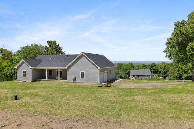 6 Turnpike Rd, Somers, CT 06071 - back of property with dirt driveway and a lawn