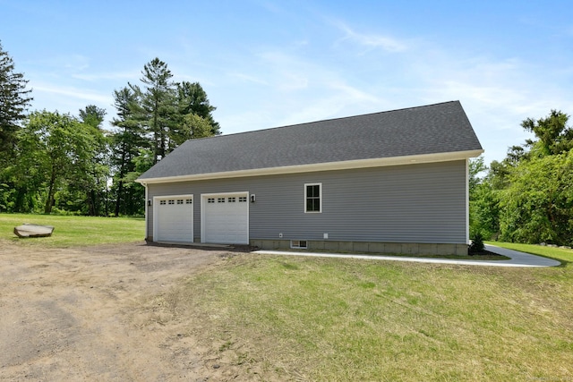 6 Turnpike Rd, Somers, CT 06071 - view of side of property featuring a detached garage, a yard, and an outdoor structure