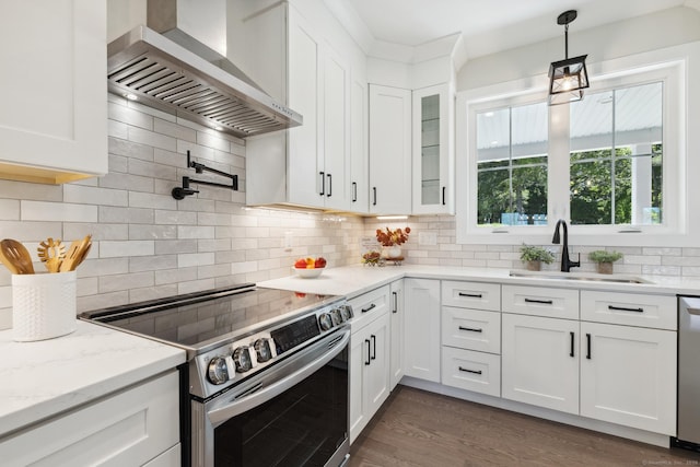 6 Turnpike Rd, Somers, CT 06071 - kitchen with wall chimney range hood, stainless steel appliances, a sink, white cabinets, and glass insert cabinets