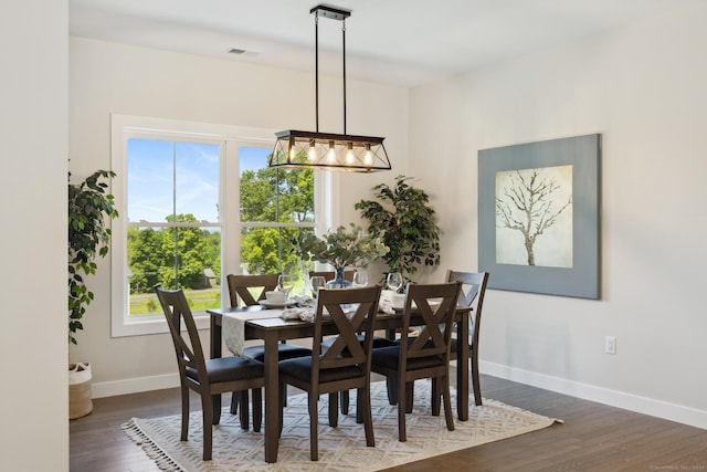 6 Turnpike Rd, Somers, CT 06071 - dining room with baseboards, wood finished floors, and a chandelier