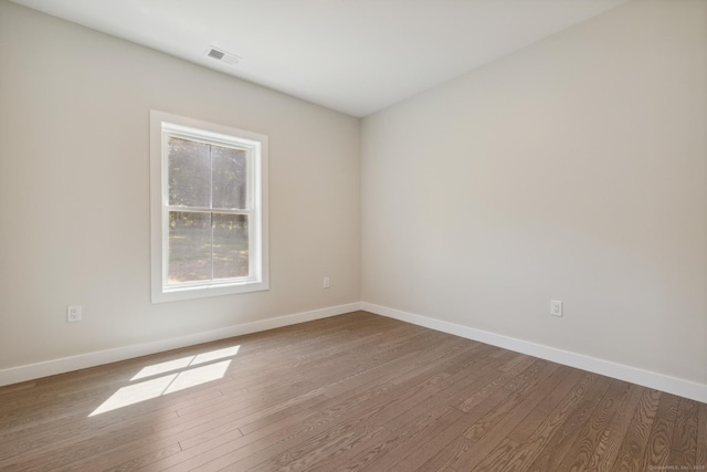 6 Turnpike Rd, Somers, CT 06071 - empty room featuring wood finished floors and baseboards