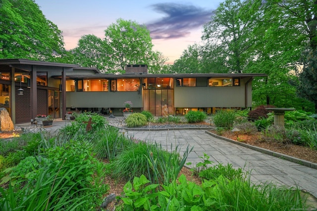 25 Ketcham Rd, Ridgefield, CT 06877 - back of house at dusk with driveway