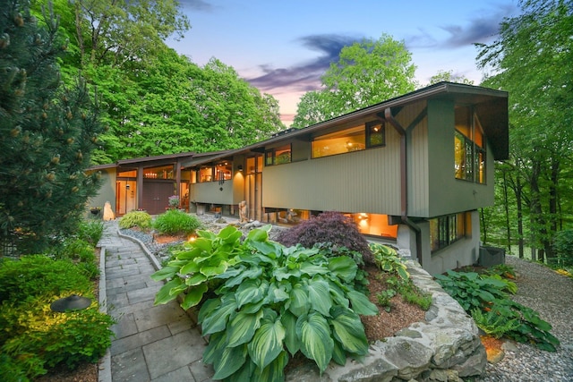 25 Ketcham Rd, Ridgefield, CT 06877 - property exterior at dusk with stucco siding
