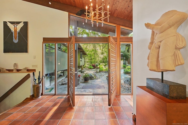 25 Ketcham Rd, Ridgefield, CT 06877 - entryway with wood ceiling with exposed beams, a chandelier, high vaulted ceiling, and tile patterned floors