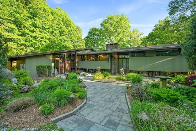 25 Ketcham Rd, Ridgefield, CT 06877 - view of front of home with a chimney
