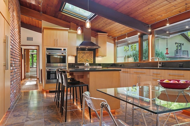 25 Ketcham Rd, Ridgefield, CT 06877 - kitchen with double oven, wooden ceiling with exposed beams, wall chimney exhaust hood, light brown cabinets, and dark countertops