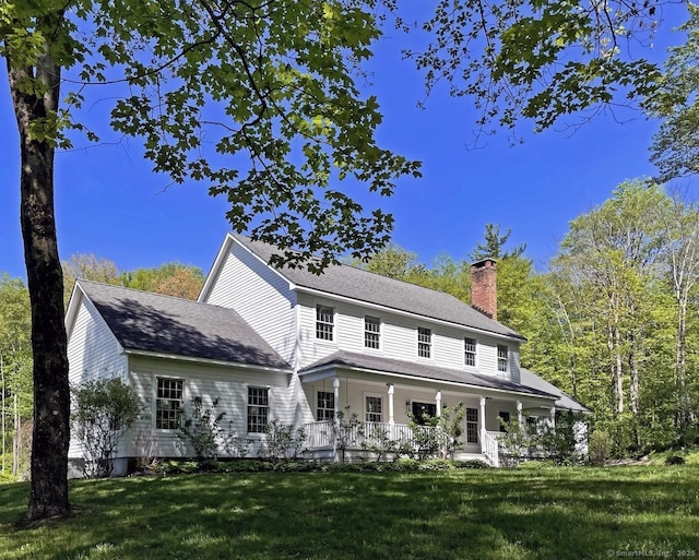 200 Sharon Mountain Rd, Sharon, CT 06069 - view of front of house featuring a chimney, a porch, and a front yard