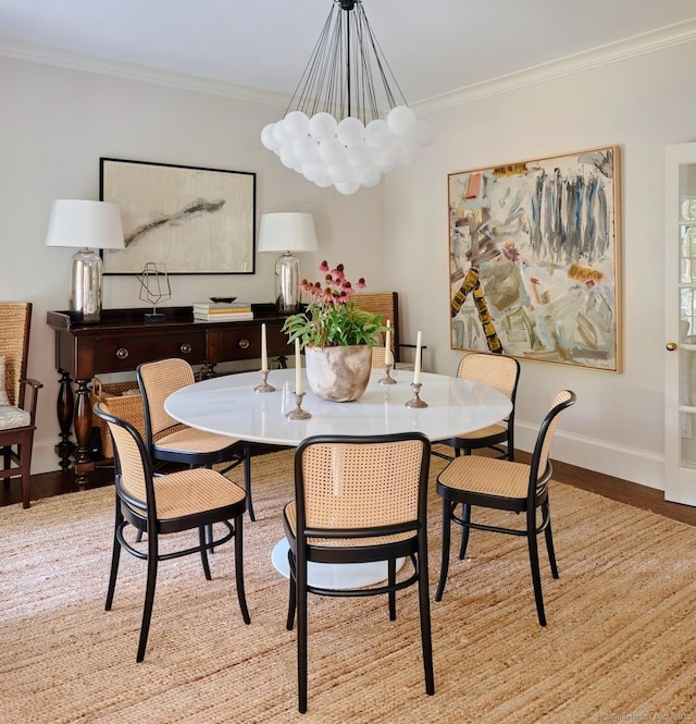 200 Sharon Mountain Rd, Sharon, CT 06069 - dining area with wood finished floors, baseboards, a chandelier, and crown molding