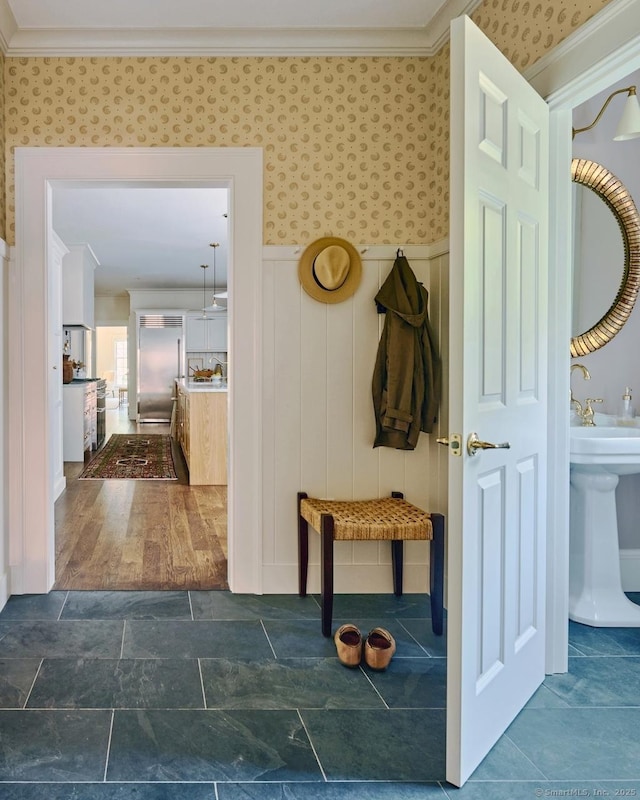 200 Sharon Mountain Rd, Sharon, CT 06069 - mudroom featuring ornamental molding, a wainscoted wall, and wallpapered walls