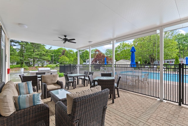 24 Boulder Trl, Killingworth, CT 06419 - view of patio / terrace with an outdoor hangout area, a ceiling fan, an outdoor kitchen, outdoor dining area, and view of scattered trees