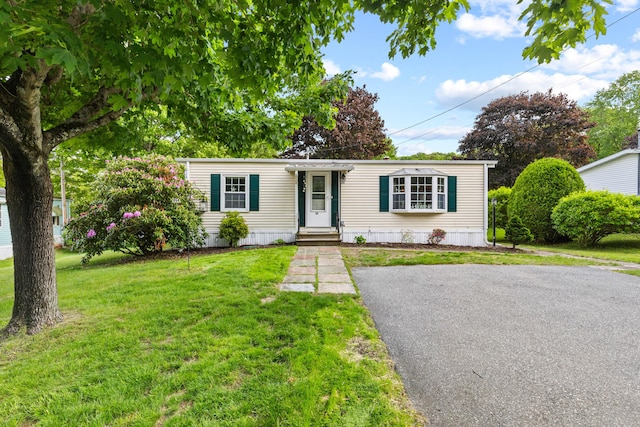 24 Boulder Trl, Killingworth, CT 06419 - manufactured / mobile home with a front lawn and driveway