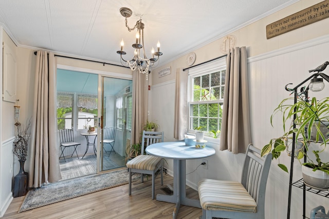 24 Boulder Trl, Killingworth, CT 06419 - dining room featuring a chandelier, wood finished floors, and crown molding