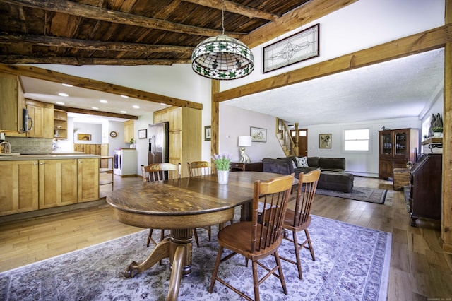156 Ballamahack Rd, Windham, CT 06280 - dining area featuring stairway, light wood-type flooring, beamed ceiling, a baseboard radiator, and recessed lighting