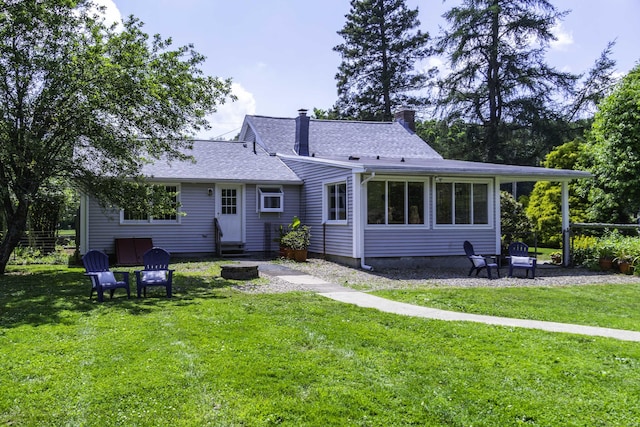 156 Ballamahack Rd, Windham, CT 06280 - back of house with roof with shingles, a yard, entry steps, and a chimney