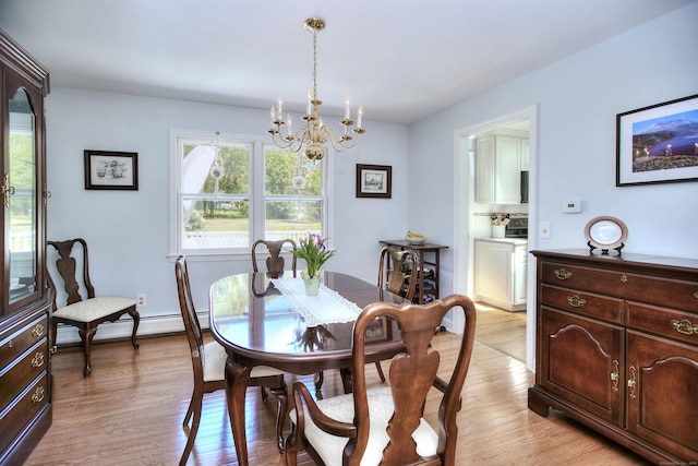 85 Oakridge Rd, Trumbull, CT 06611 - dining room with a chandelier, light wood-style flooring, and baseboard heating