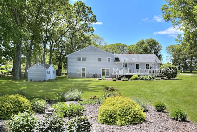 85 Oakridge Rd, Trumbull, CT 06611 - back of house with a wooden deck, a lawn, and a chimney