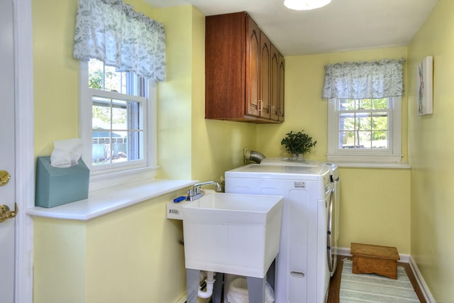 85 Oakridge Rd, Trumbull, CT 06611 - laundry room featuring cabinet space and separate washer and dryer