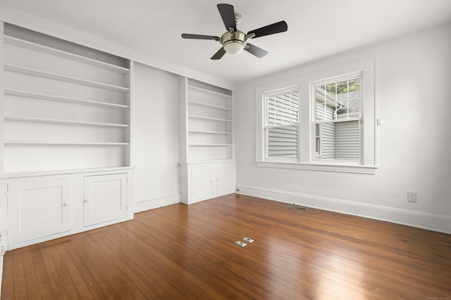 10 Paddock Pl, Milford, CT 06461 - spare room featuring a ceiling fan, wood finished floors, baseboards, and built in features