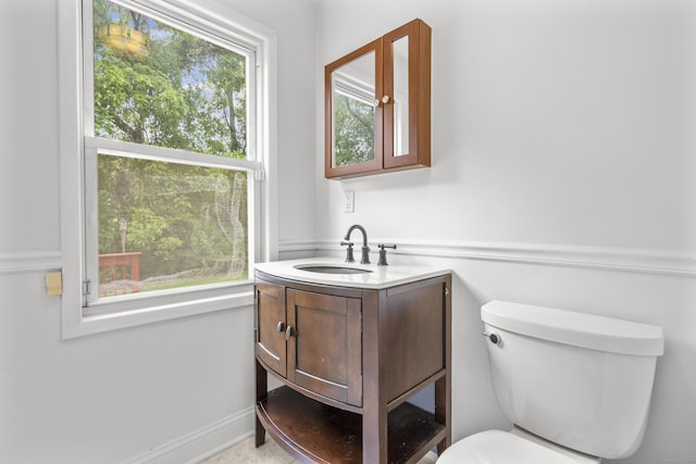 10 Paddock Pl, Milford, CT 06461 - bathroom with vanity, toilet, and baseboards