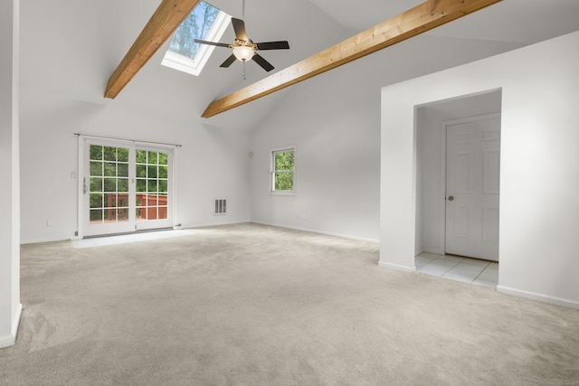 10 Paddock Pl, Milford, CT 06461 - unfurnished living room featuring a ceiling fan, beam ceiling, a skylight, carpet floors, and high vaulted ceiling