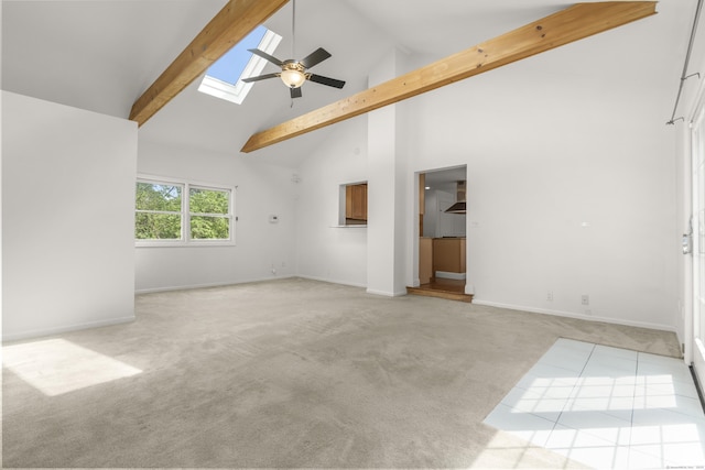 10 Paddock Pl, Milford, CT 06461 - empty room featuring high vaulted ceiling, ceiling fan, carpet flooring, a skylight, and beam ceiling