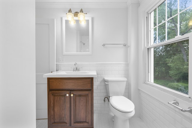 10 Paddock Pl, Milford, CT 06461 - bathroom featuring tile walls, healthy amount of natural light, toilet, crown molding, and vanity