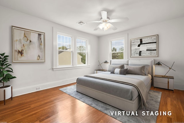 10 Paddock Pl, Milford, CT 06461 - bedroom featuring baseboards, wood finished floors, and a ceiling fan