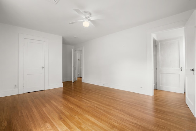 10 Paddock Pl, Milford, CT 06461 - empty room with ceiling fan, light wood finished floors, and baseboards