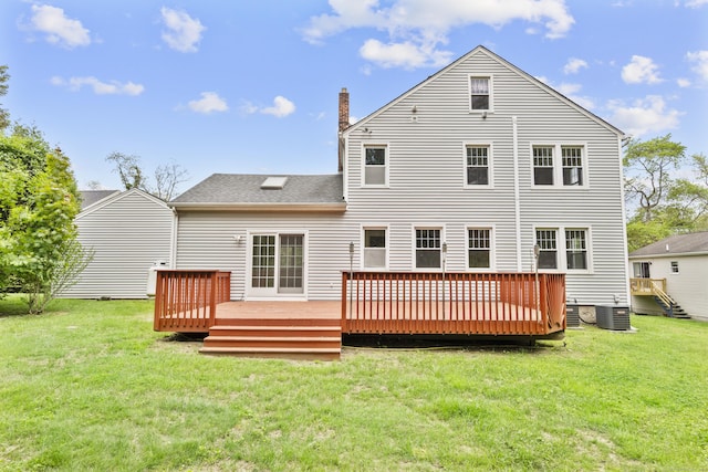 10 Paddock Pl, Milford, CT 06461 - back of property featuring a chimney, a lawn, central air condition unit, and a deck
