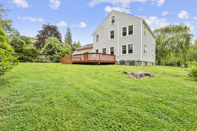 10 Paddock Pl, Milford, CT 06461 - rear view of property featuring a yard, a wooden deck, and cooling unit