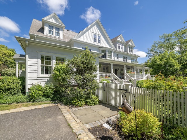 304 Main St, Ridgefield, CT 06877 - view of front of house featuring a porch