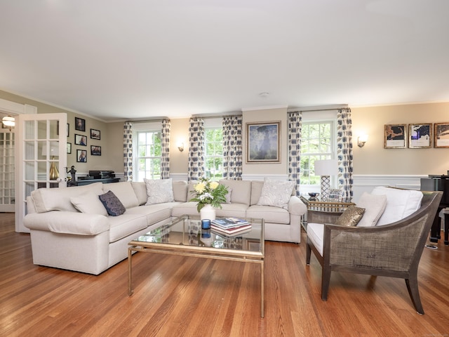 304 Main St, Ridgefield, CT 06877 - living area with ornamental molding, wainscoting, wood finished floors, and a decorative wall