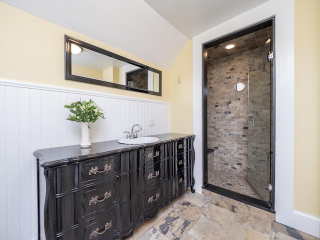 304 Main St, Ridgefield, CT 06877 - full bath with vanity, a shower stall, a wainscoted wall, and stone finish floors