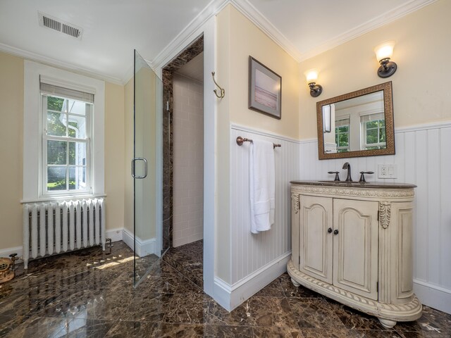 304 Main St, Ridgefield, CT 06877 - full bathroom featuring radiator, wainscoting, tiled shower, vanity, and crown molding