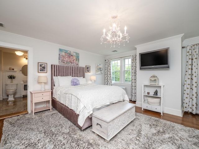 304 Main St, Ridgefield, CT 06877 - bedroom with ornamental molding, a chandelier, wood finished floors, baseboards, and ensuite bath
