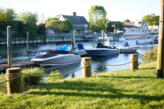 11 Elliott St, Norwalk, CT 06855 - dock area featuring a water view and a lawn