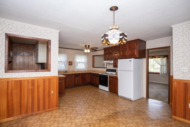 7 Cheryl Ave, Wallingford, CT 06492 - kitchen with white appliances, a wainscoted wall, wallpapered walls, under cabinet range hood, and ornamental molding