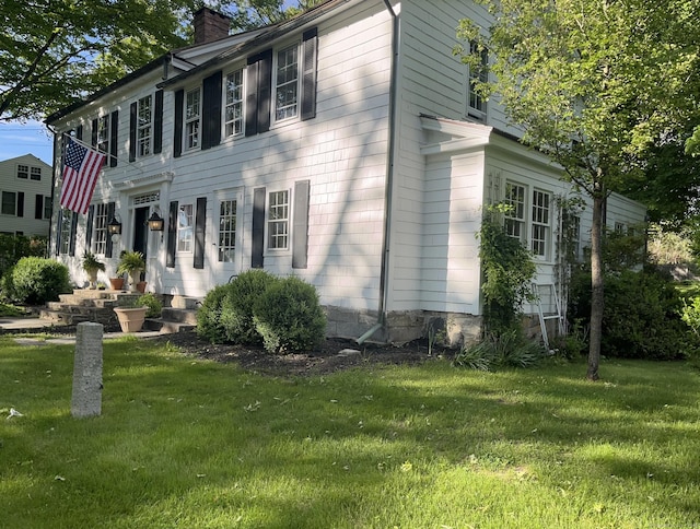 118 Sanfordtown Rd, Redding, CT 06896 - colonial inspired home featuring a front yard and a chimney