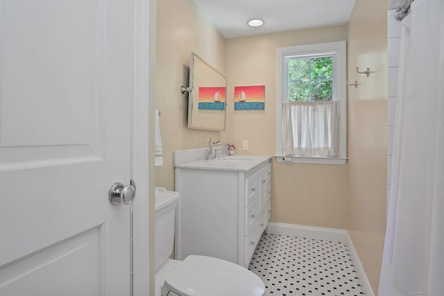11 Ledgewood Rd, Redding, CT 06896 - bathroom with baseboards, vanity, toilet, and tile patterned floors