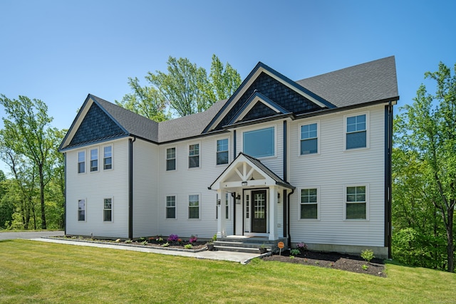 26 Hunting Ridge Rd, Brookfield, CT 06804 - view of front of home with a front lawn and roof with shingles