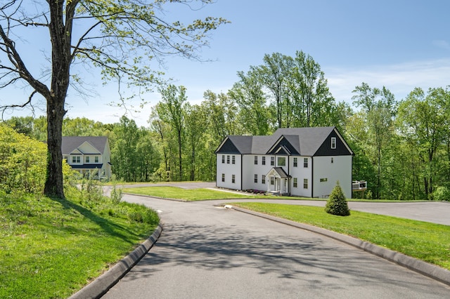 26 Hunting Ridge Rd, Brookfield, CT 06804 - view of front of home with curved driveway and a front yard