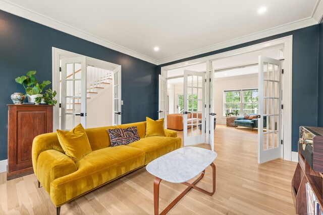 26 Hunting Ridge Rd, Brookfield, CT 06804 - living room featuring french doors, ornamental molding, light wood finished floors, stairs, and baseboards