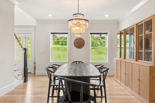 26 Hunting Ridge Rd, Brookfield, CT 06804 - dining room featuring healthy amount of natural light, light wood-style flooring, a chandelier, crown molding, and recessed lighting